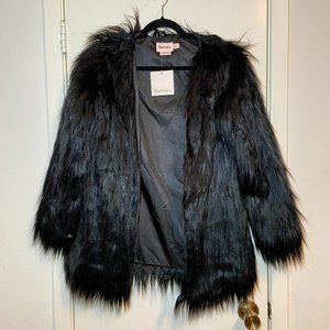 black faux fur coat